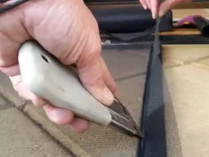 Demonstration of cutting flyscreen